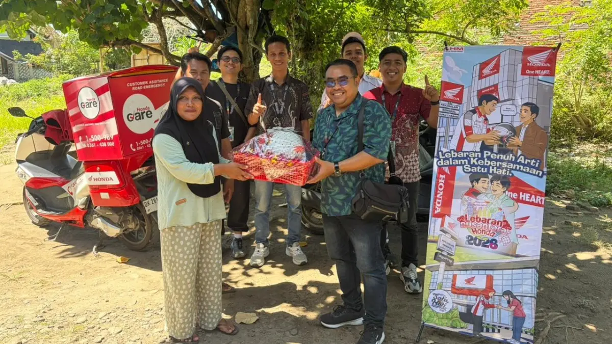 Lilis Tiana pelanggan setia Astra motor Bali asal Negara mendapat apresiasi spesial dari Astra Motor. (Ist)