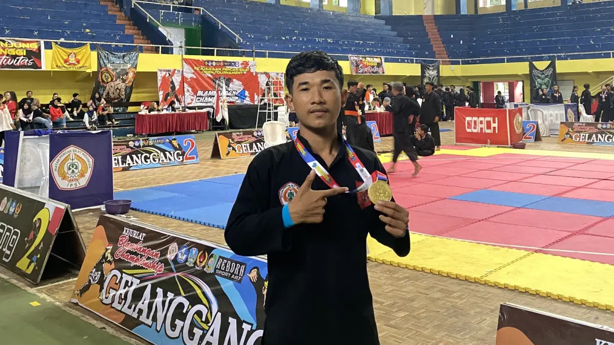 Kadek Suana, mahasiswa INSTIKI, berhasil meraih Juara 1 dalam ajang Blambangan Championship 4 cabang olahraga pencak silat tingkat nasional.