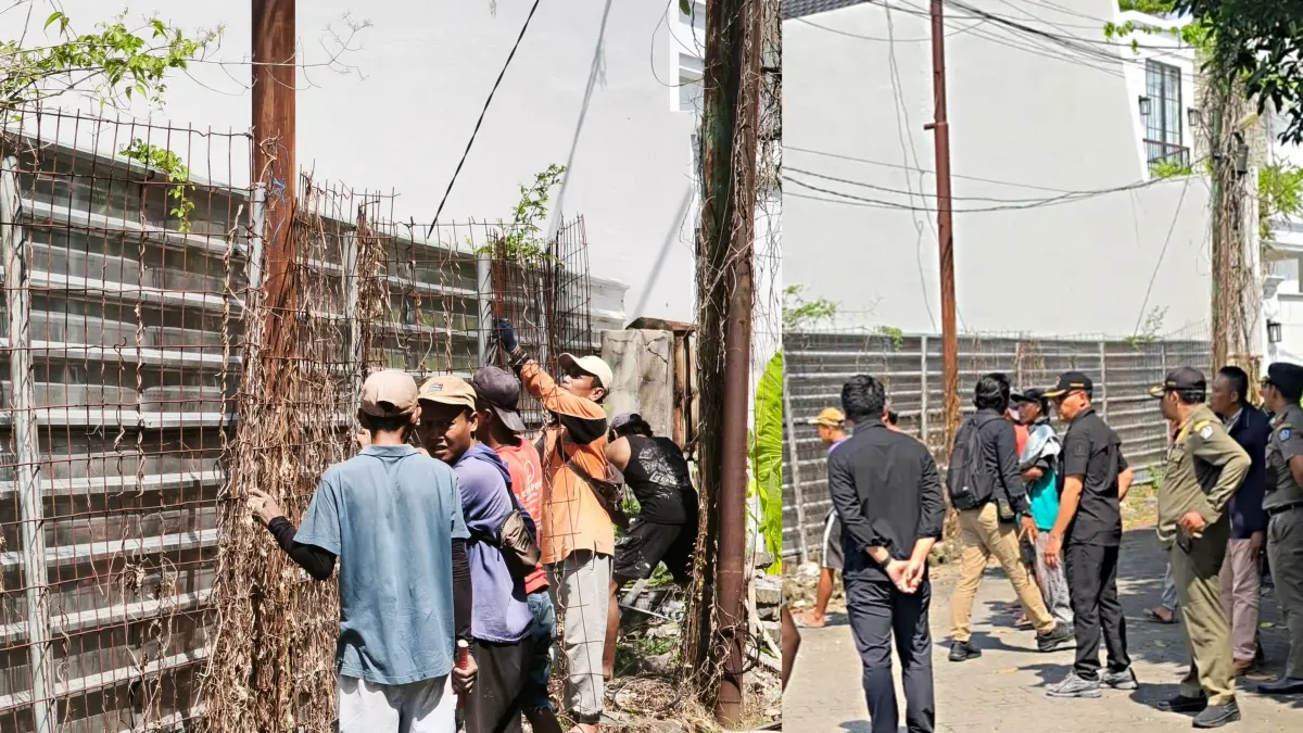 Pembongkaran pagar besi di atas fasilitas umum oleh Satpol PP Kabupaten Badung di Kerobokan Kelod. (Bali Express/I Gede Paramasutha)