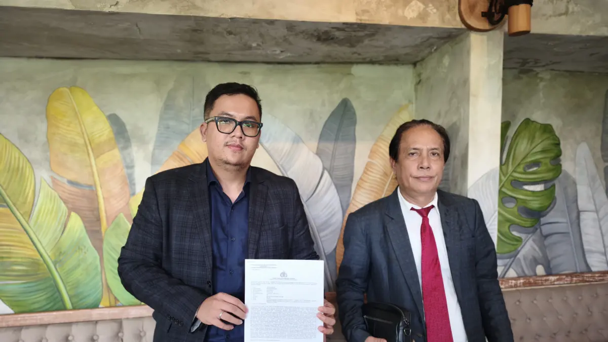 Kuasa Hukum ZA, Marusaha Sitorus, SH., dan Jonathan P Panjaitan, SH. (Bali Express/I Gede Paramasutha)