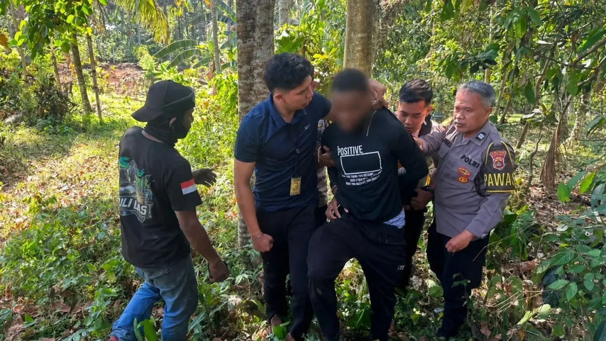 Maduabuchi John Ndummadu, WNA Nigeria yang overstay di Tabanan ditangkap petugas Imigrasi setelah mencoba melarikan diri. (Ist)
