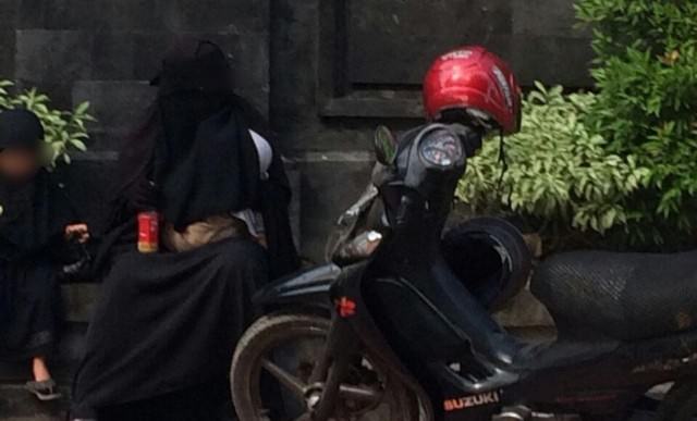 Ini Penjelasan Polda Bali Soal Wanita Bercadar yang Viral di Medsos