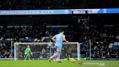SKOR : Papan skor di Stadion Etihad memperlihatkan kedudukan 6-3 dalam laga Boxing Day Liga Inggris antara Manchester City kontra Leicester City, Minggu (26/12/2021).