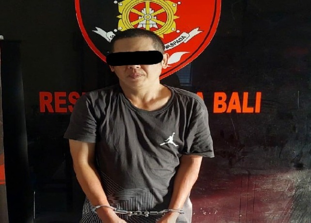 DIBEKUK: JA saat diamankan di Mapolda Bali. (ISTIMEWA)