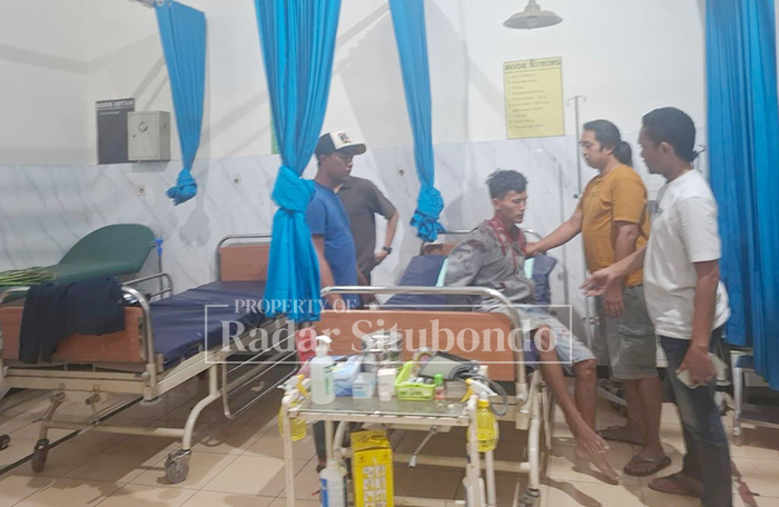 CIDERA: RHW, 30, warga Desa Pendil, Kecamatan Banyuanyar, Kabupaten Probolinggo, dirawat di Puskesmas Banyuglugur, Jumat (30/1).