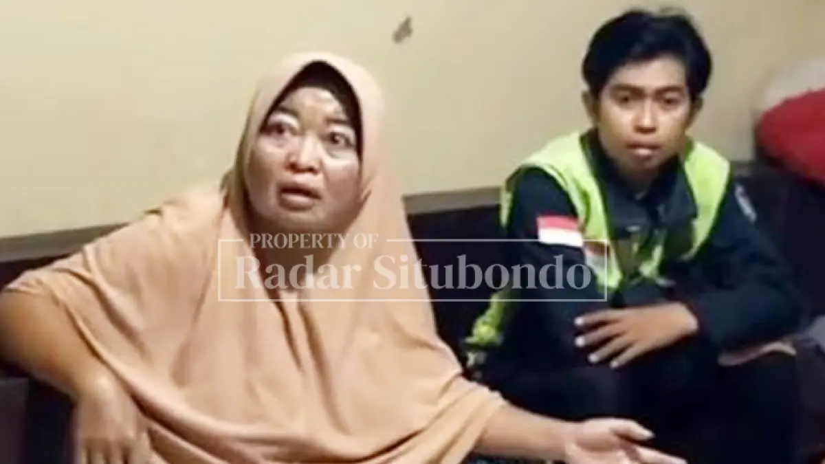 TERSANGKA: Eli Erna Idayanti, 50, (berkerudung) warga Kelurahan Ardirejo, Kecamatan Panji digeruduk driver ojol, belum lama ini. (HUMAIDI/JPRS)
