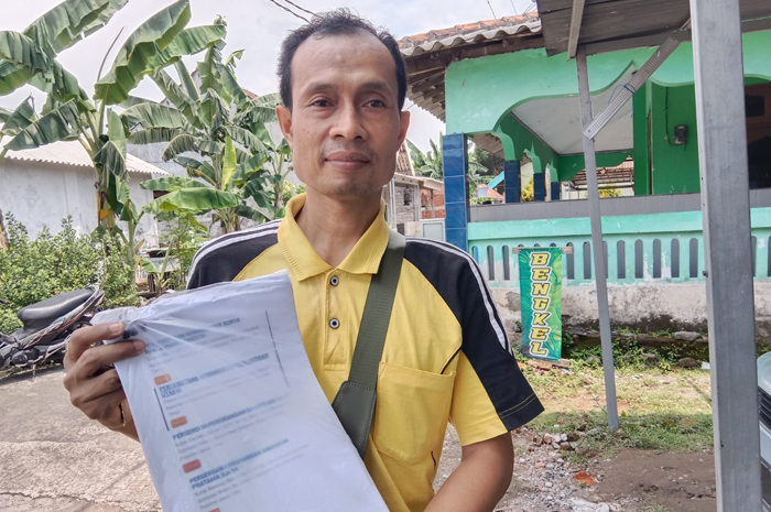 LAPOR POLISI: Korban aplikasi Smart Wallet di Jombang menempuh jalur hukum melapor ke Polres Jombang.