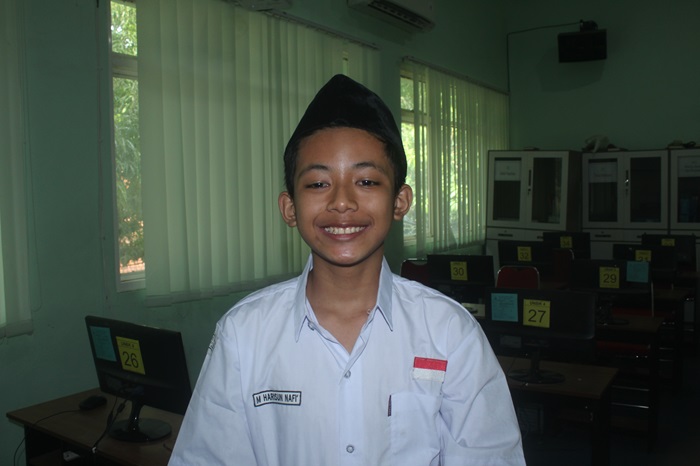 M Harisun Naf&rsquo;i,  kelas 9-F SMP A Wahid Hasyim Tebuireng, Jombang