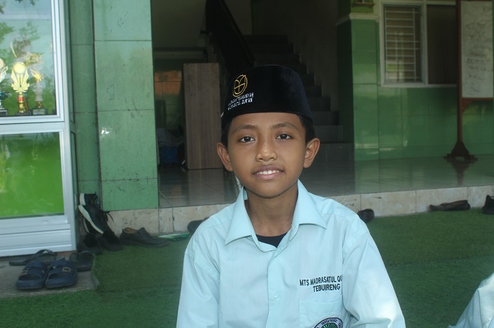Muhammad Achsan Mudzoffar, siswa Kelas 7 Tahfidz 1 MTs MQ Tebuireng, Jombang.