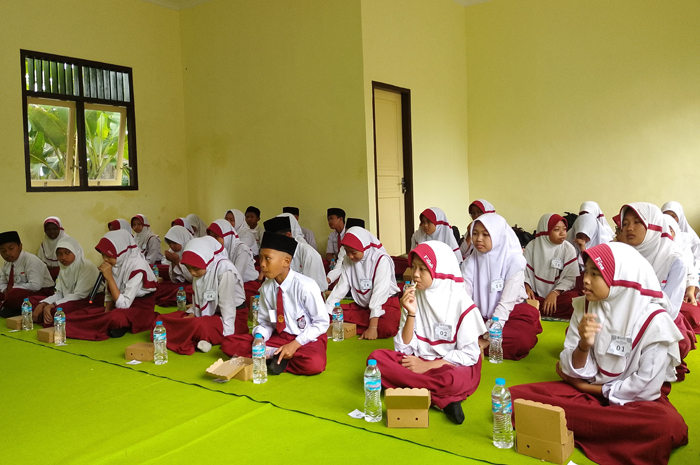 SEMANGAT: Munaqosah tahfiz juz 30 digelar di Kecamatan Wonosalam, Jombang.