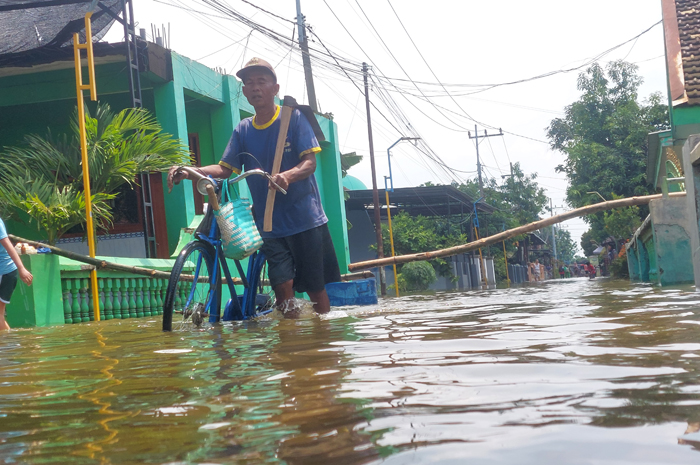TERENDAM: Dusun Gedang, Desa Jatigedong, Ploso, Jombang terdampak banjir, Jumat (21/11).