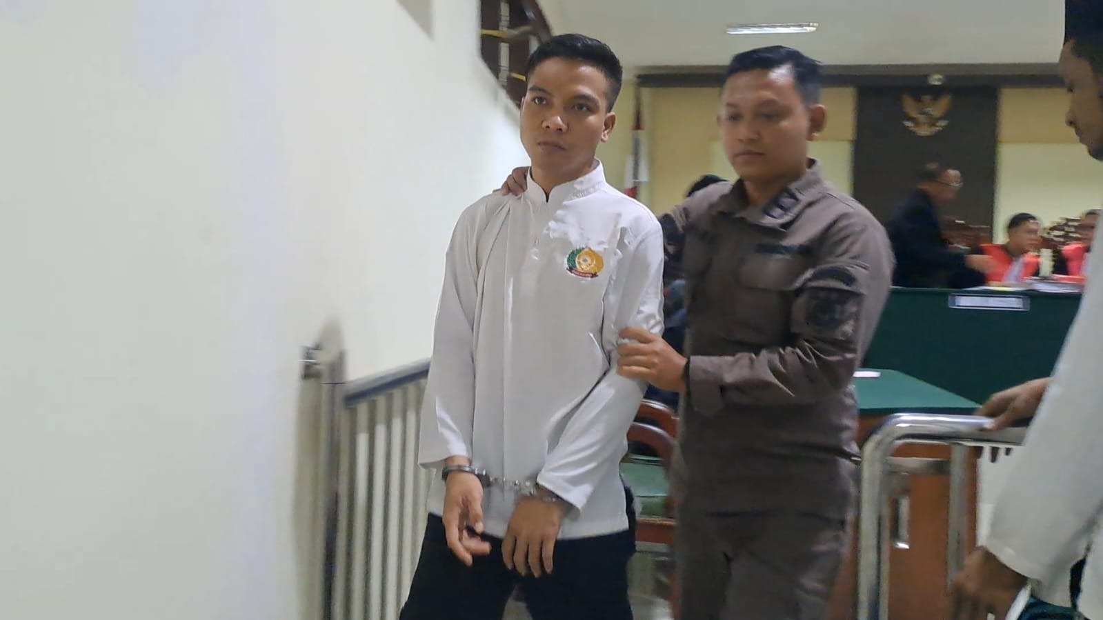 Jackvanden Ganggadarma Juni Gloria, 23, pelaku pembunuhan balita di Kecamatan Mojoagung, Jombang usai menjalani sidang.