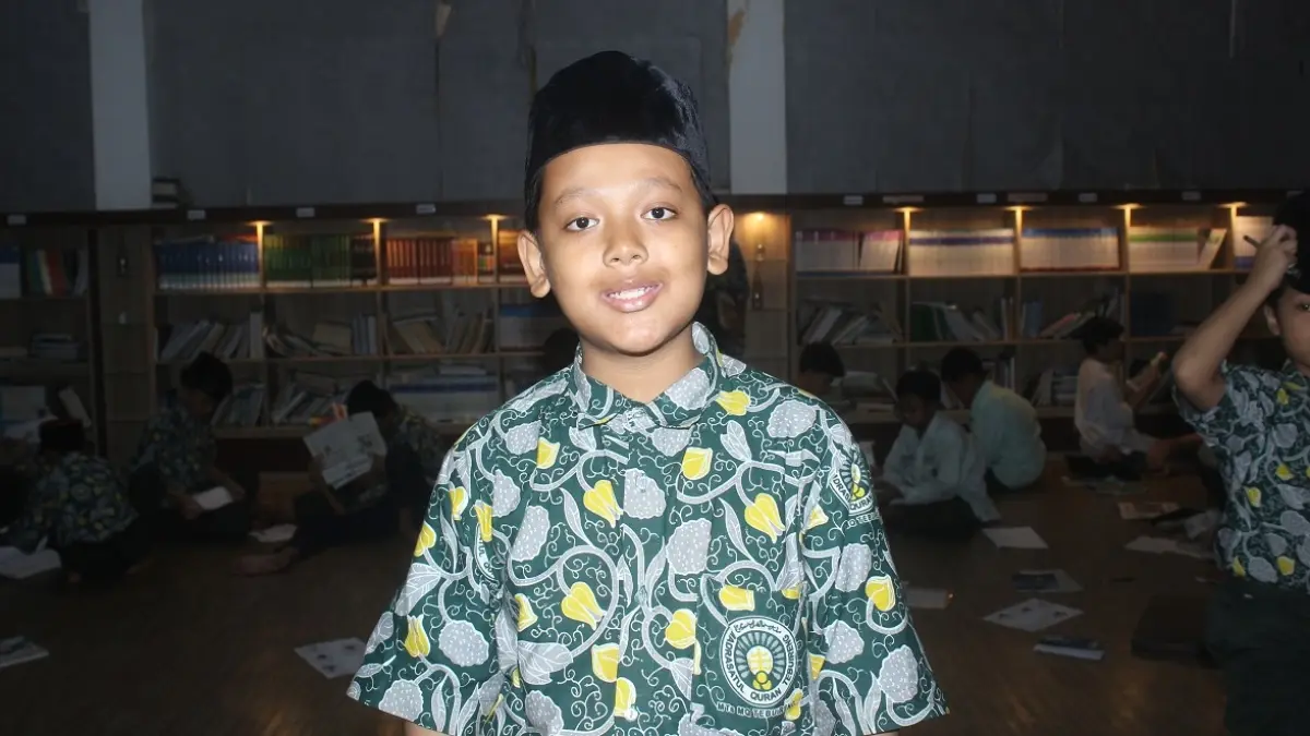 M Abdullah Jazari, Kelas 8 Tahfidz 2 MTs MQ Tebuireng, Jombang. (Rojiful Mamduh/Radar Jombang)