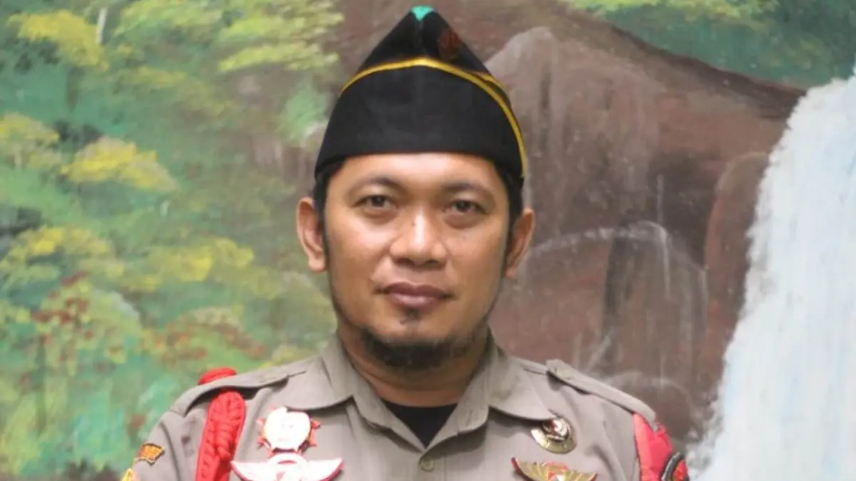 Amirul Umam SIP, Kepala Satuan Koordinasi Cabang Barisan Ansor Serbaguna (Kasatkorcab Banser) Jombang dan Sekretaris Desa Tengaran, Kecamatan Peterongan, Jombang. (Dwi Aris/Radar Jombang)