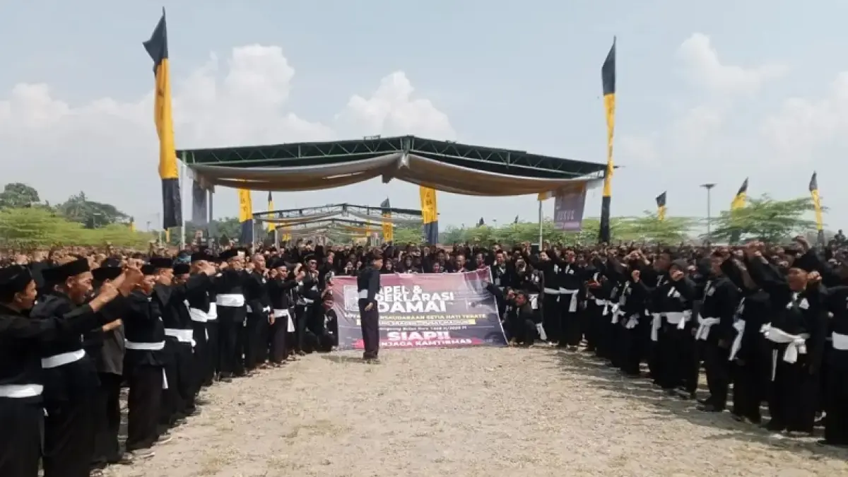 Ribuan warga PSHT Cabang Sragen Pusat Madiun ikrar damai di Padepokan Cabang di Desa Patihan, Kecamatan Sidoharjo, Sragen, Minggu (24/5/2026). ISTIMEWA
