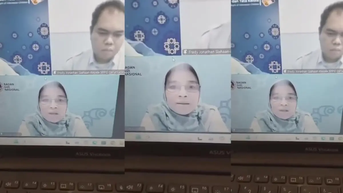 Potongan gambar rekaman video Zoom yang memperlihatkan seorang terduga pejabat perempuan Badan Gizi Nasional (BGN) saat menegur peserta rapat dengan nada tinggi. (Foto: Tangkapan Layar Threads @ketua_rt09)