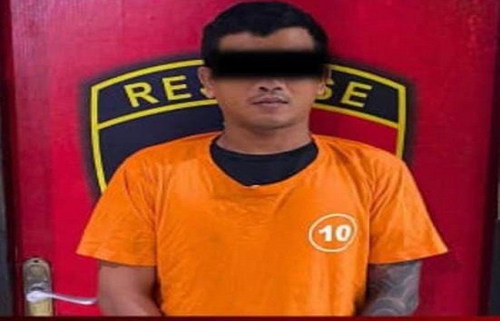 Tersangka Moh Yusuf alias Jimmy, 50, diamankan Polsek Kuta Utara.