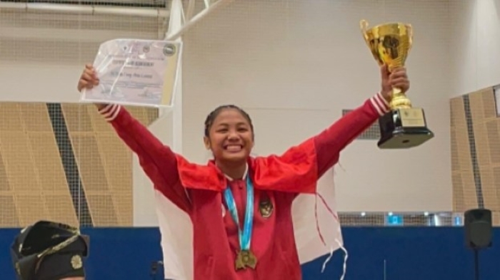 PRESTASI: Atlet pencak silat asal Buleleng, Ni Putu Fany Aria Lestari meraih medali emas dan predikat atlet terbaik pada kejuaraan pencak silat di Australia.