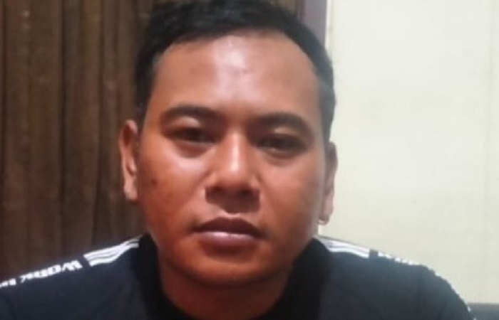 Tersangka pembakaran rumah bernama I Putu Pasek Pranatha, 34, saat diciduk pihak berwajib.