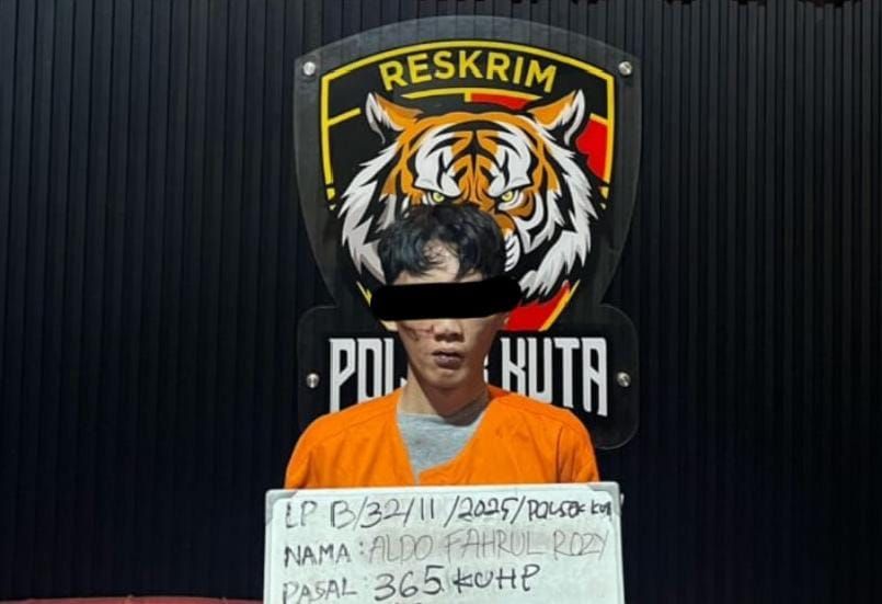 NEKAT: Aldo Fahrul Rozy Muhammad Wahid, 25, mengenakan pakaian tahanan Polsek Kuta.