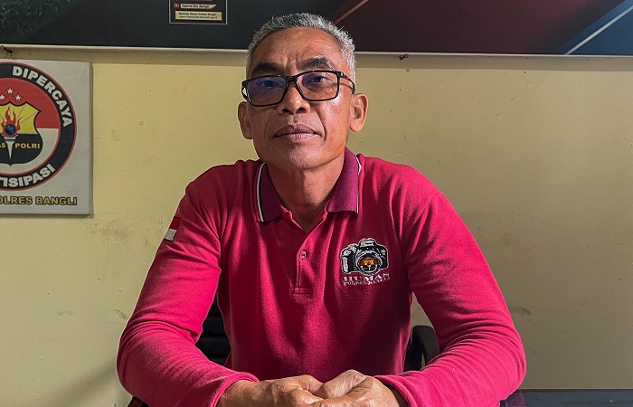 Kasubsipenmas Polres Bangli, Aipda I Nengah Wirata memberikan keterangan terkait pembunuhan di arena tajen.