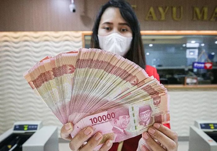Ilustrasi penyaluran Bantuan Subsidi Upah (BSU) 2025 sebesar Rp 600 ribu bagi pekerja berpenghasilan rendah.
