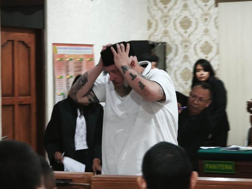 PAKAI PECI: WNA asal Jerman, Daniel Domalski dinyatakan bebas karena tidak terlibat jaringan narkoba Eropa.