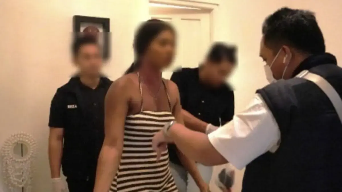 GEREBEK PROSTITUSI: Petugas Imigrasi Ngurah Rai dan tim gabungan saat menggerebek praktik prostitusi online yang melibatkan WNA di Bali. (istimewa)