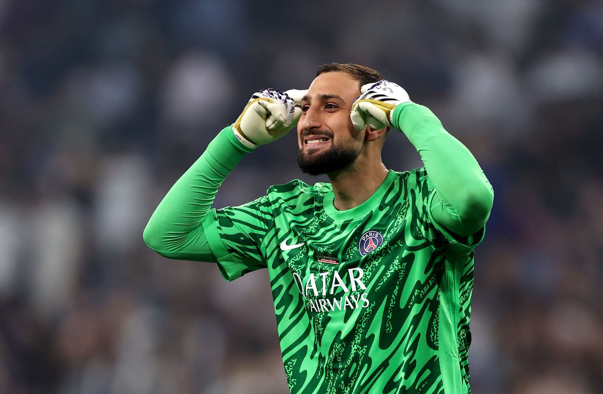 MUNICH, GERMANY - MAY 31: Gianluigi Donnarumma of Paris Saint-Germain celebrates after Desire Doue of Paris Saint-Germain (not pictured) scores his team