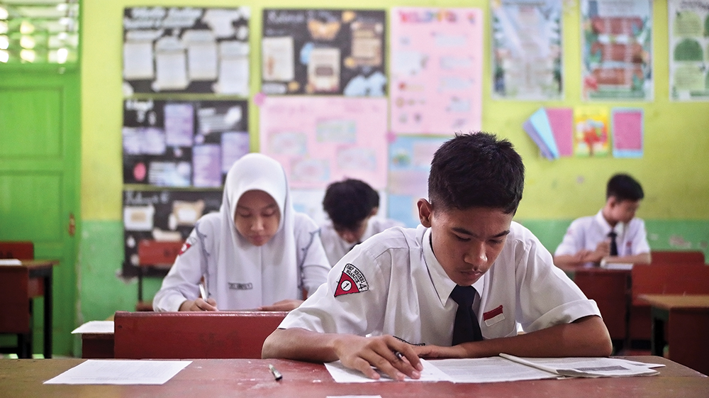 TRY OUT LAGI: Siswa SMPN 4 Nganjuk mengerjakan try out TKA. Besok try out TKA menggunakan sistem CAT agar siswa terbiasa.