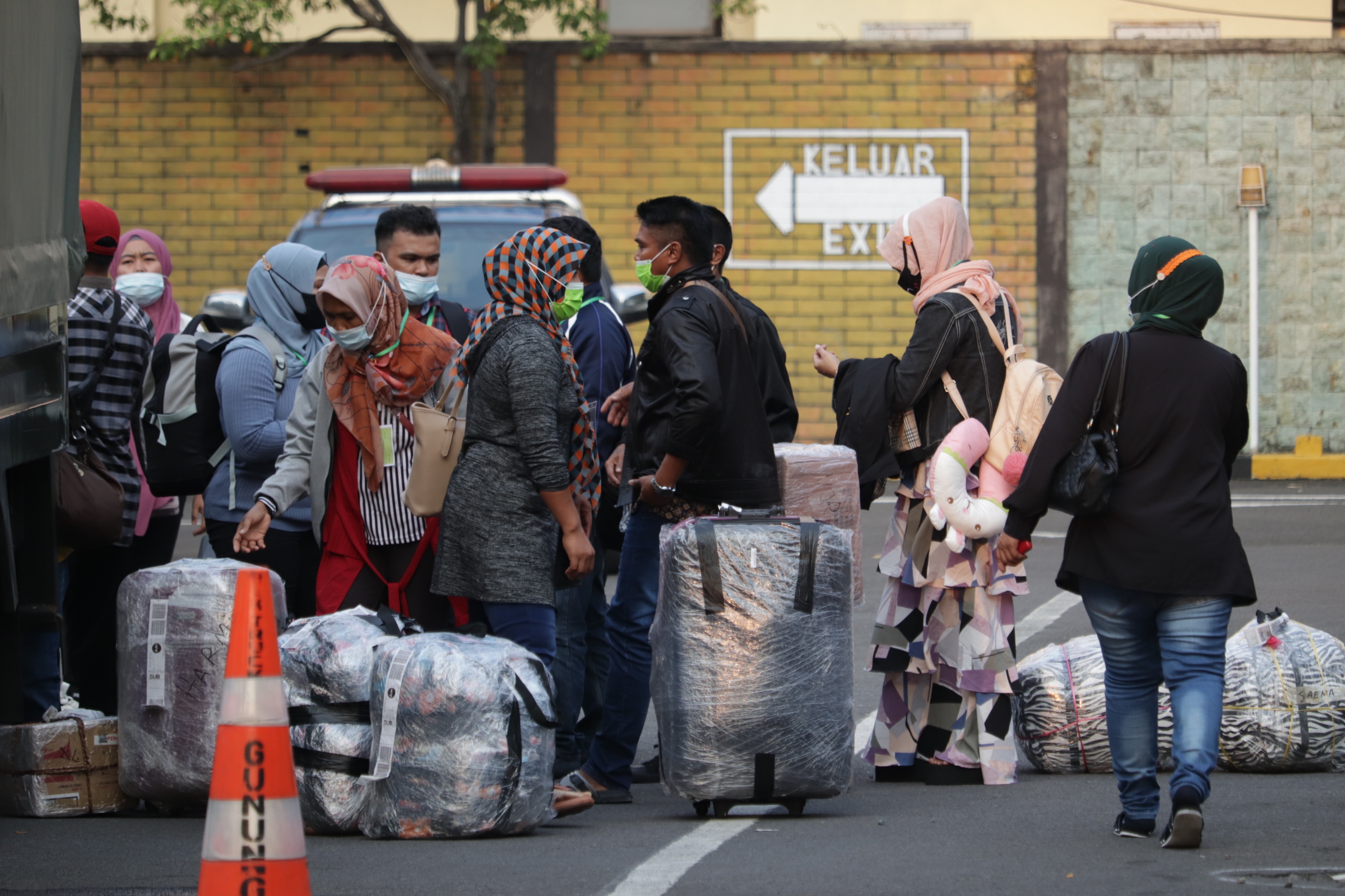 PAHLAWAN DEVISA: Pekerja migran tak hanya mensejahterakan keluarga, tetapi juga berkontribusi pada perekonomian negara.