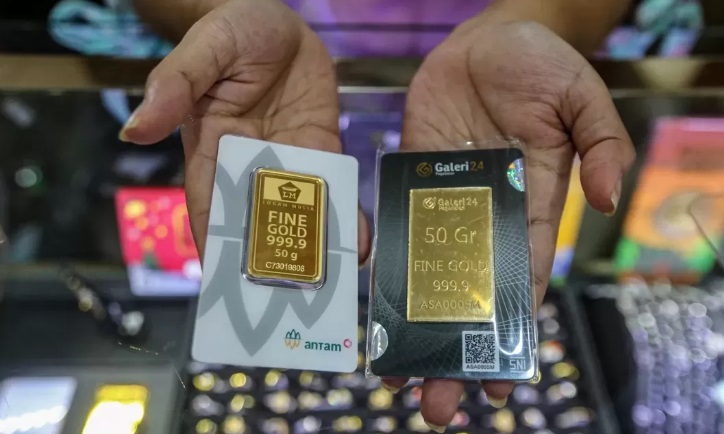 ISTIMEWA: Harga emas Antam pagi ini, Kamis, 22 Agustus 2024 pukul 08.30 mengalami penurunan Rp 5.000 menjadi Rp 1.410.000 per gram. (JAWAPOS.COM)