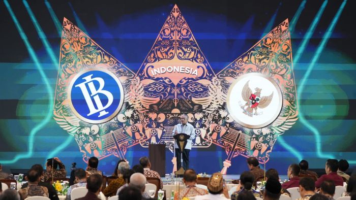 SINERGI: Gubernur BI Perry Warjiyo menyampaikan sejumlah pokok pikiran perekonomian nasional di Pertemuan Tahunan Bank Indonesia di Jakarta, Jumat (29/11).