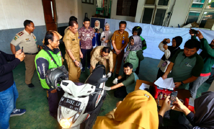 BAHAGIA: Cek emisi kendaraan secara gratis untuk 100 driver ojol dalam rangka bulan K3.