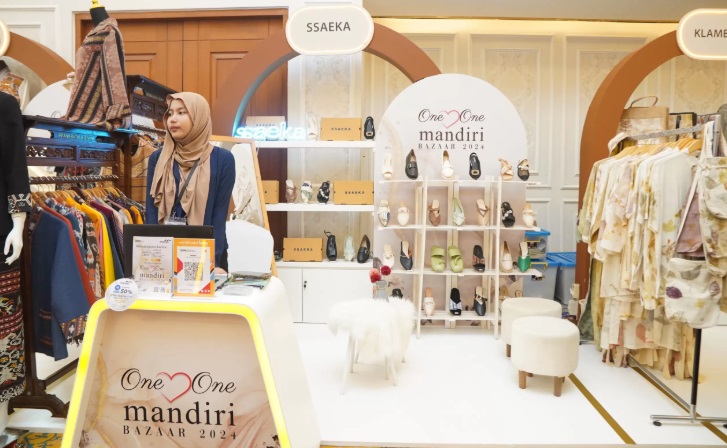 PAMERAN: PT Bank Mandiri Tbk (BMRI) mencatat realisasi penyaluran kredit untuk sektor UMKM sebesar Rp 144 triliun pada 2024, Jakarta, Jumat (28/2/2025).