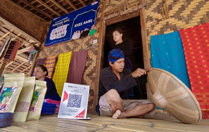 KERJA: Alokasi KUR ke sektor produksi memberikan dampak ganda bagi perekonomian nasional.