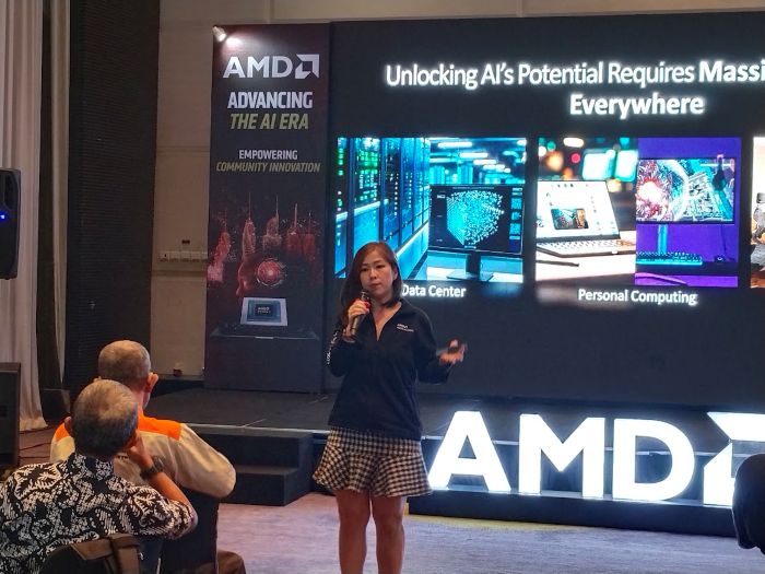 PRESENTASI: Consumer Business Development Manager AMD Indonesia, Armawati Cen menjelaskan mengenai berbagai upaya yang dilakukan AMD untuk menciptakan ekosistem AI yang cerdas.