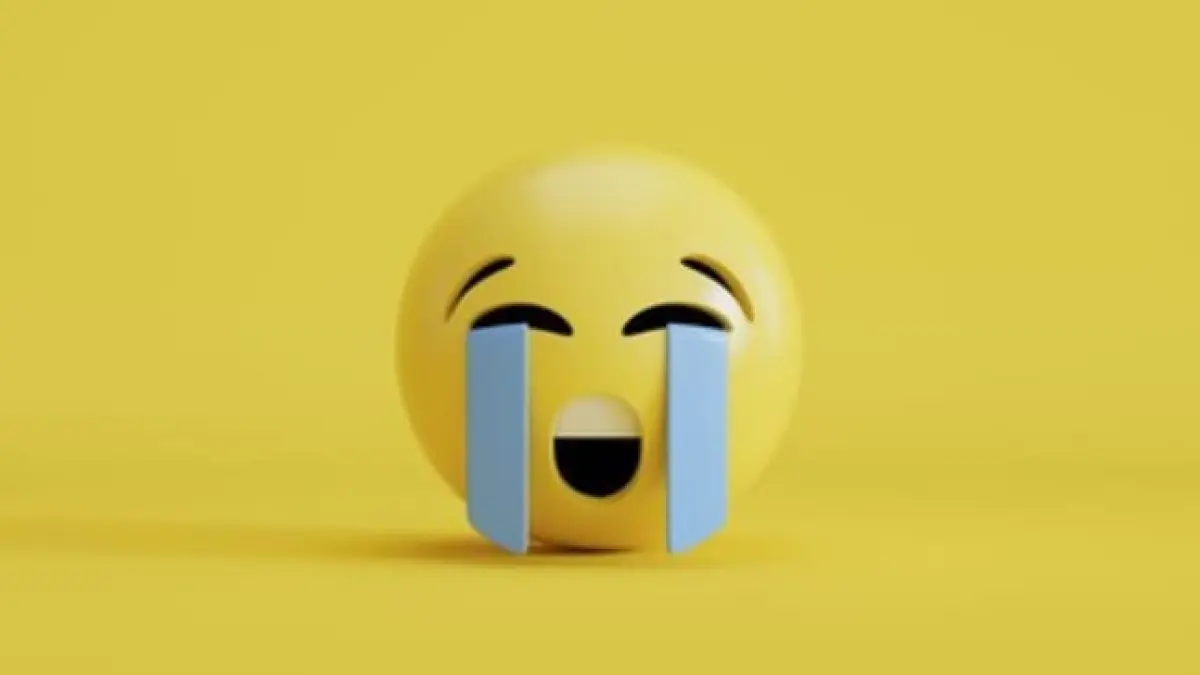 ILUSTRASI: Emoji menangis yang kini menjadi emoji terpopuler di kalangan Gen Z pada 2025, menggeser dominasi emoji tertawa untuk mengekspresikan hal-hal lucu.