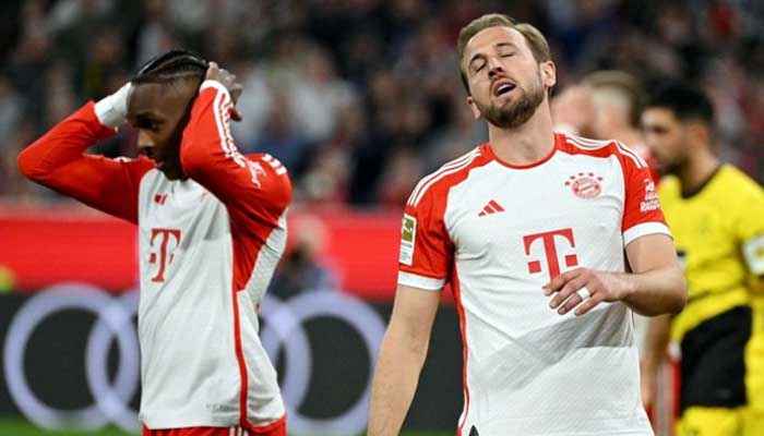 Ekspresi kekecewaan Harry Kane usai gagal memanfaatkan peluang melawan Dortmund. (Reuters)