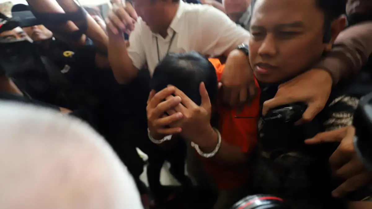 Tersangka kasus dugaan Tindak Pidana Pencucian uang (TPPU) Don Ritto usai menjalani pemeriksaan di Gedung Jampidsus Kejaksaan Agung, Jakarta, Jumat (17/7/2026). (Dery Ridwansah/ JawaPos.com)

