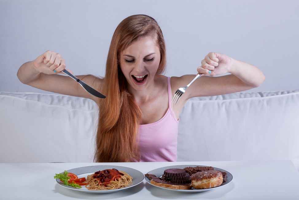 Nafsu makan meningkat saat wanita menjelang masa haid.