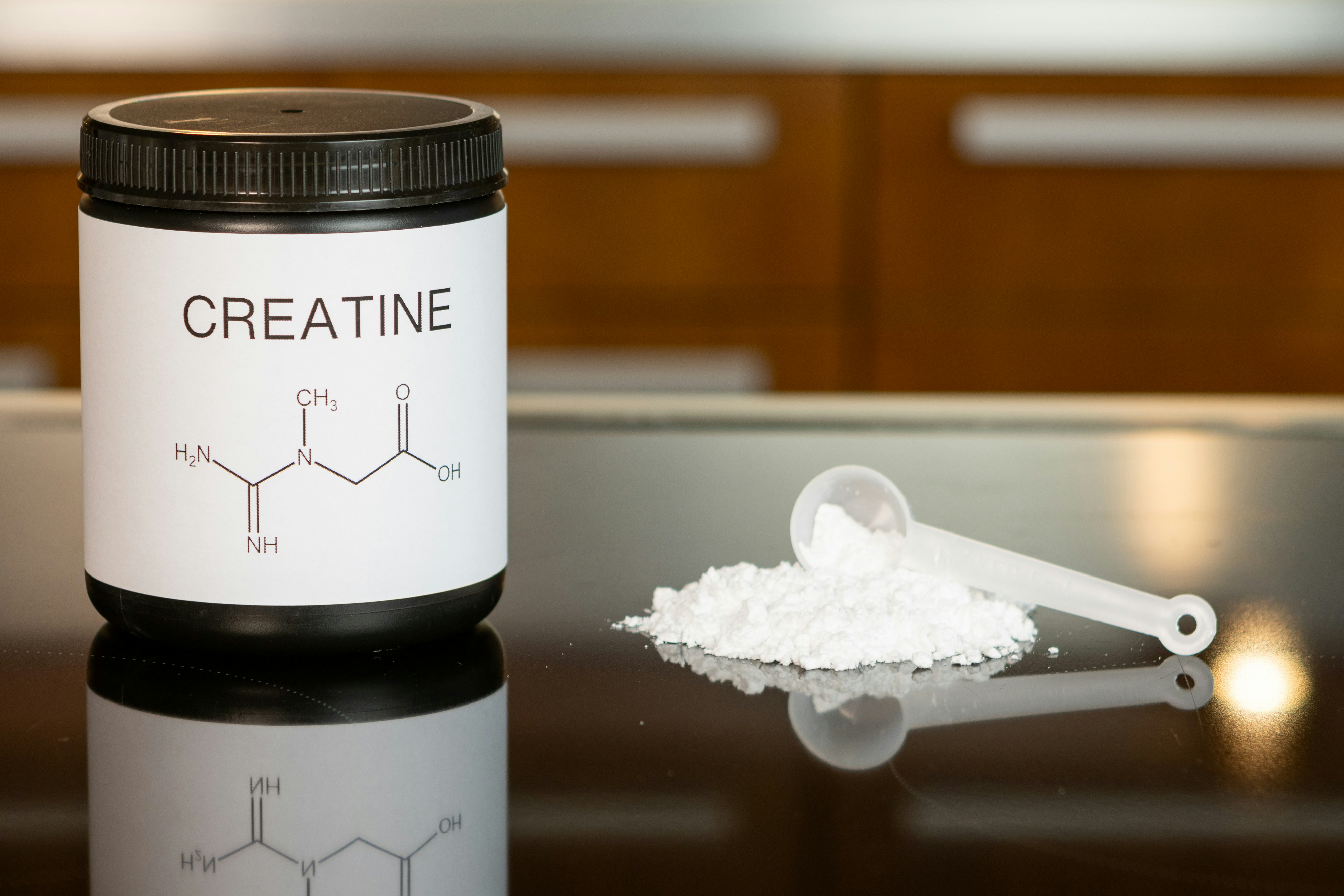 Creatine kemasan toples dalam bentuk bubuk