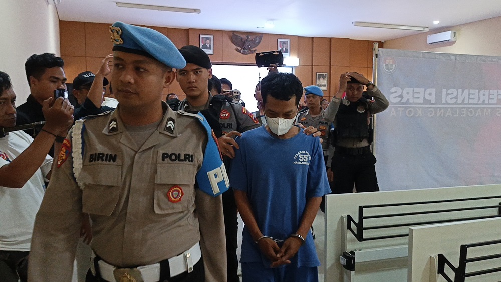 Tersangka HN, warga Rejowinangun Selatan, Magelang Selatang saat digelandang petugas Polres Magelang Kota.