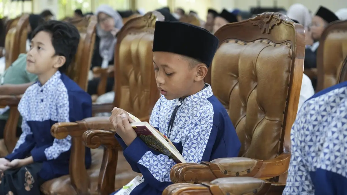 &nbsp;Peserta MTQ tingkat Kota Magelang terlihat sedang latihan sebelum namanya dipanggil oleh juri.&nbsp;