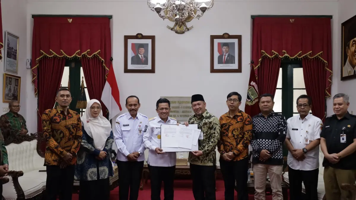 Pemkab Wonosobo menandatangani MoU dengan KPU dan Bawaslu Wonosobo di Ruang Perundingan Pendopo Bupati Wonosobo, Rabu (23/9/2026). (Diskominfo Wonosobo for Jawa Pos Radar Magelang)