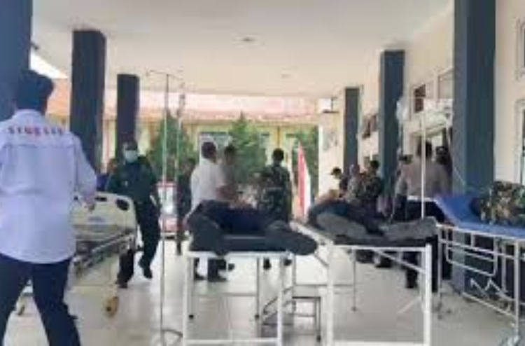 Puluhan aparat keamanan saat Presiden Jokowi kunjungan di Tasikmalaya, mengalami keracunan massal, nasi kuning menjadi pemicu utama. (ISTIMEWA)