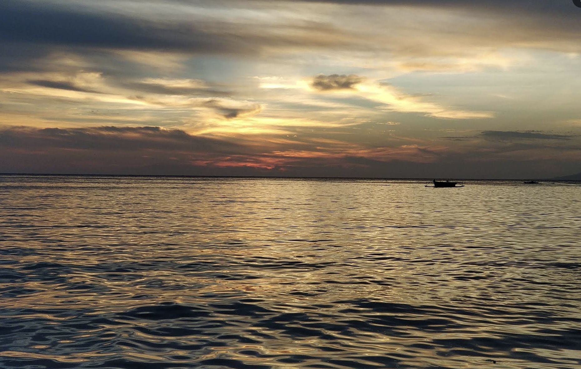 Lepas Penat dengan Keindahan Senja di Pantai Botutonuo Gorontalo