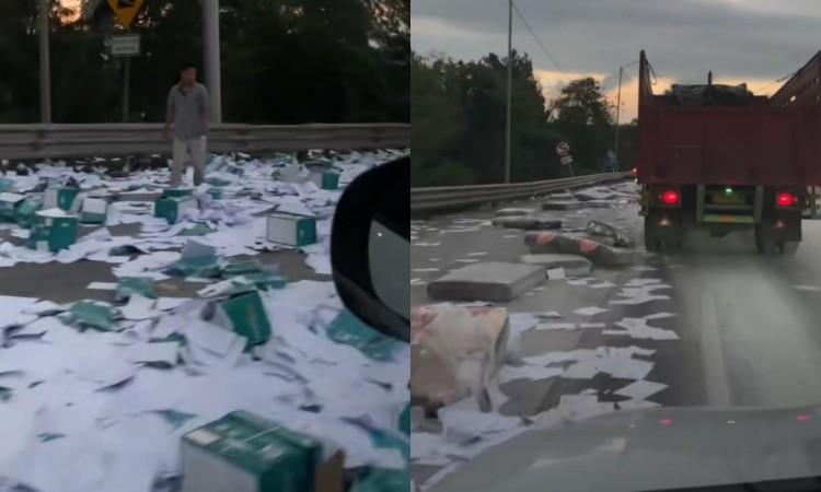 Warga jarah kasur dari truk kecelakaan di Tol Cipularang, aksi ini dikecam sebagai tindak pidana pencurian.