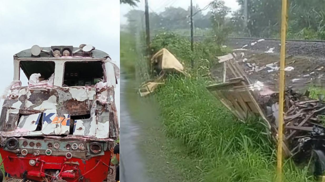 Truk (kanan) tertemper KA Kertanegara di Kediri.