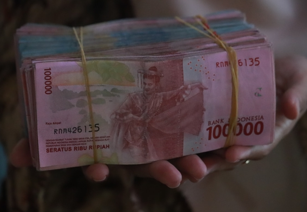 Foto ilustrasi uang rupiah - Dugaan setoran uang di kasus judi sabung ayam di Lampung.